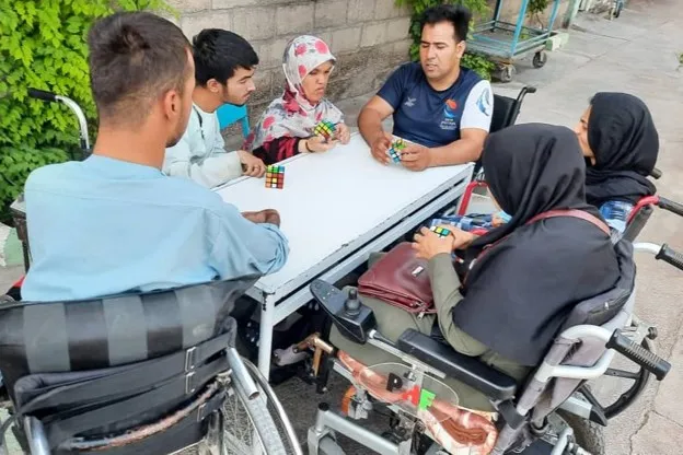A polio victim who gives joy and hope to other polio victims